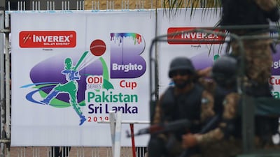 Pakistani Army soldiers secure the National Stadium before the match was called off due to heavy rains. EPA