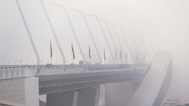 Abu Dhabi, United Arab Emirates, September 22, 2020. The Sheikh Zayed Bridge is engulfed by fog on a Tuesday morning. Victor Besa/The National Section: Standalone/Weather