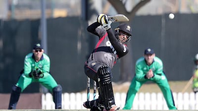 UAE batsman Ghulam Shabber plays a shot en route to 21 against Ireland at Dubai on Thursday. Pawan Singh / The National