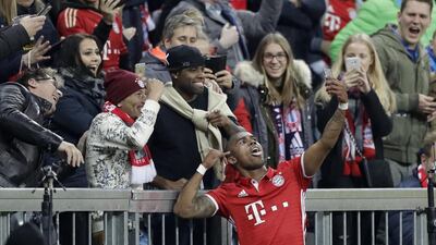 Bayern Munich's Douglas Costa takes a selfie after scoring his side's second goal against Borussia Monchengladbach at the Allianz Arena on Saturday, October 22, 2016. Matthias Schrader / AP Photo