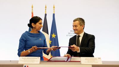 UK Home Secretary Suella Braverman signs the deal with French Interior Minister Gerald Darmanin in Paris. PA
