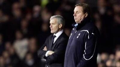 QPR fans made their preferred choice known by displaying banners of Harry Redknapp, right, to replace Mark Hughes at Loftus Road.