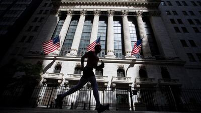 A jogger passes in front of the New York Stock Exchange (NYSE) in New York, U.S., on Wednesday, June 17, 2020. U.S. stocks fluctuated as the recent rally begins to show signs of losing momentum amid a worrying increase in coronavirus cases. Photographer: Michael Nagle/Bloomberg