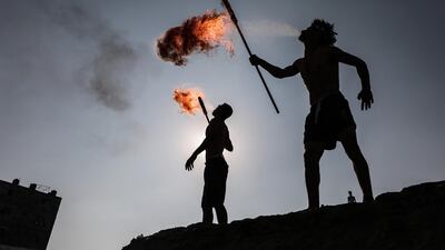 A fire-breathing performance in Gaza. Photo by Majd Mahmoud