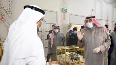 Kuwaiti Prime Minister Sheikh Sabah al-Khaled al-Sabah, wearing a protective mask visit one of the polling station in Kuwait City. EPA