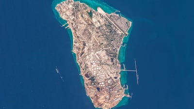 This handout image taken by the European Space Agency (ESA) captured by the Copernicus Sentinel-2 satellite shows a view of Iran's Kharg Island, which hosts the country�s main crude export terminal and is responsible for the overwhelming majority of its oil shipments to the world, about 30 kilometres south of the mainland in the north of the Gulf, on March 7, 2026. The US and Israel have previously treaded carefully around the island in the conflict, but an Axios report over the weekend cited Trump administration officials saying capturing Kharg was on the table. The island handles roughly 90 percent of Iran's crude exports, according to a JP Morgan note released on March 8. (Photo by EUROPEAN SPACE AGENCY / AFP) / RESTRICTED TO EDITORIAL USE - MANDATORY CREDIT "AFP PHOTO / ESA" - HANDOUT - NO MARKETING NO ADVERTISING CAMPAIGNS - DISTRIBUTED AS A SERVICE TO CLIENTS