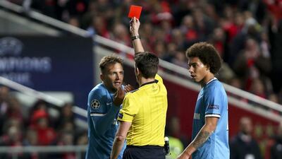 Zenit St. Petersburg’s Domenico Criscito (L) reacts after being shown a red card during the UEFA Champions League Round of 16, first leg soccer match at Luz Stadium in Lisbon, Portugal, 16th February 2016. EPA/JOSE SENA GOULAO