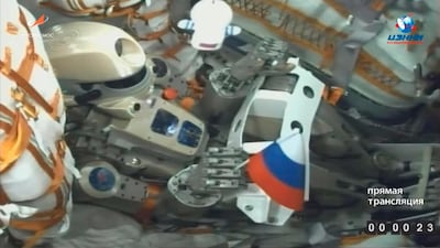 Russian humanoid robot Skybot F-850 (Fedor) is seen inside the Soyuz MS-14 spacecraft as it lifts off from the launch pad. EPA