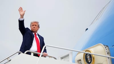 US President Donald Trump boards Air Force One as he leaves Joint Base Elmendorf-Richardson in Anchorage, Alaska. AFP