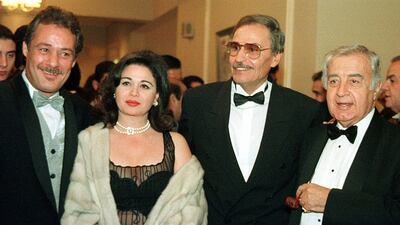 From left: Egyptian film stars Faruq al-Fishawi, Elham Shahine, Ezzat Al Alaili and Syrian mega-film producer Mustafa Al-Aqqad attend the awards ceremony at the 23rd Cairo International Film Festival, December 4, 1999. AFP