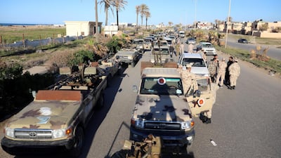Military vehicles of Misrata forces, under the protection of Tripoli's troops, are seen in Tajura neighborhood , east of Tripoli. Reuters