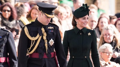 To honour Irish Guards on St Patrick's Day, March 17, the Duchess of Cambridge wears a green coat by Alexander McQueen, with a colour-matched pillbox hat and Gianvito Rossi pumps. The look is finished with a Cartier shamrock brooch. Getty Images