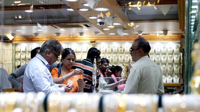 Dubai, United Arab Emirates, December 18, 2015: People browse in a shop in the Gold Souk area of Deira in Dubai on December 18, 2015. Christopher Pike / The National