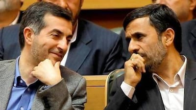 Mahmoud Ahmadinejad, right, and Esfandiar Rahim Mashaie at an Iranian expatriates summit in Tehran in 2009. Behrouz Mehri / AFP