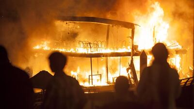 Flames lit up the sky above Dubai Marina when a restaurant boat moored near Al Rahim Mosque was destroyed by fire. Firefighters and ambulances rushed to the scene of the blaze at about 7.30pm, and the area was cordoned off. There were no reports of injuries. Antonie Robertson / The National