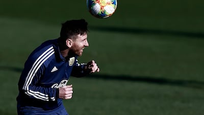 Argentina forward Lionel Messi takes part in heading practice. AFP