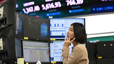 Asian markets are dealing not only with a deeper sell-off in AI stocks but also the tightening of financial conditions, analysts say. AFP