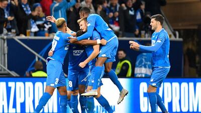 Belfodil, second left, celebrates scoring the opening goal with his teammates. AFP