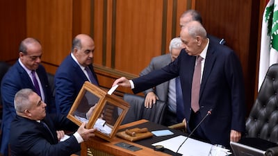 Nabih Berri (R), the Lebanese Parliament Speaker, casts his vote to elect a new president of Lebanon. EPA