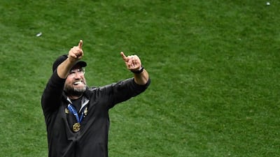 Klopp celebrates on the pitch at the final whistle. AFP