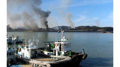 South Korea's Yeonpueong Island is engulfed in thick smoke as North Korea reportedly fired hundreds of artillery from its stronghold on the west coast toward the South Korean waters.