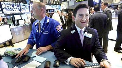The Dow Jones Industrial Average rose on the open after setting a record on Tuesday, as doubts over $85 billion of spending cuts were replaced by optimism that the US economic recovery was back on track. Richard Drew / AP Photo