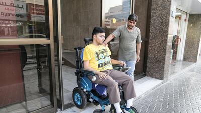 Sharan Anil Budhrani, who has muscle dystrophy, at his home in Deira. Reem Mohammed / The National