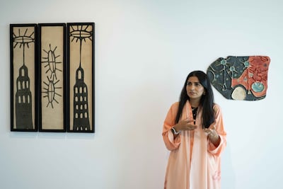 Al Hashemi draws on sun symbols, buildings and other elements of the built environment throughout The Horizon We Inherit. Ryan Lim for The National