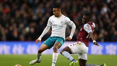 Manchester City forward Gabriel Jesus is challenged by Aston Villa midfielder Marvelous Nakamba. Getty Images