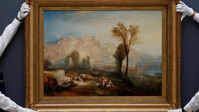 Members of staff hold the painting 'Ehrenbreitstein' by artist J.M.W. Turner at Sotheby's auction house in London, Britain June 30, 2017. REUTERS/Stefan Wermuth NO RESALES. NO ARCHIVES