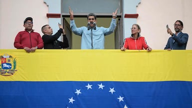 Venezuelan President Nicolas Maduro, with his wife Cilia Flores, speaking at a rally in Caracas in 2024. AFP