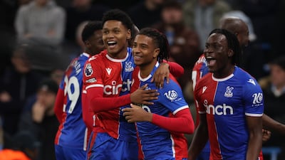 Michael Olise of Crystal Palace, centre, celebrates making it 2-2 against Manchester City. EPA