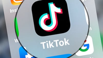(FILES) This file photograph taken on March 23, 2022, shows logo of the networking application TikToK displayed on a tablet in Lille, northern France. - TikTok on Monday said it will start letting some popular accounts at the video-snippet streaming star charge subscriptions for live streams. Similar money-making tools have been added to rivals such as Instagram and Facebook as the social media platforms compete for online personalities that attract audiences. (Photo by DENIS CHARLET / AFP)