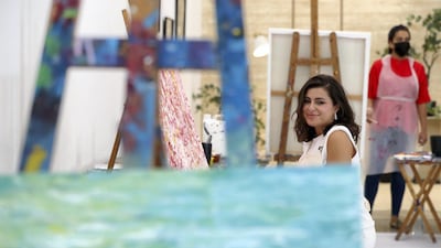 The event is divided into three zones, including the 'bright white' art zone.