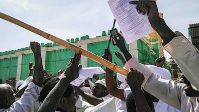 Sudanese protesters chant slogans against President Omar Al Bashir in Khartoum's twin city of Omdurman on January 25, 2019. AFP