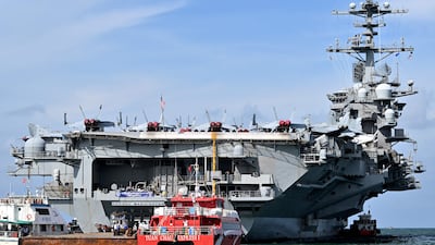 The USS George Washington aircraft carrier arrives in Danang on July 3. AFP