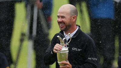 Brian Harman of the US celebrates with the Claret Jug after winning the 151st Open Championship by six shots at Royal Liverpool Golf Club in Hoylake on Sunday, July 23, 2023. Reuters