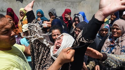 Relatives of Tunisian police officer Sgt Arbi Guizani attend his funeral on July 9, 2018, in Ettadhamen, a suburb of the capital Tunis. Six members of Tunisia's security forces were killed on July 8 in a "terrorist attack" near the border with Algeria, the country's deadliest such incident in over two years. AFP