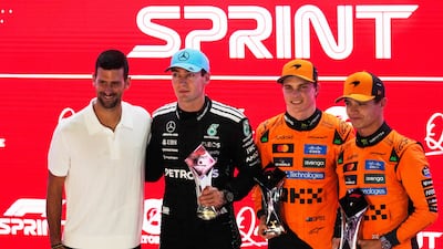 Left to right: Tennis star Novak Djokovic, George Russell, Oscar Piastri and Lando Norris after the sprint race at the Lusail International Circuit. AP