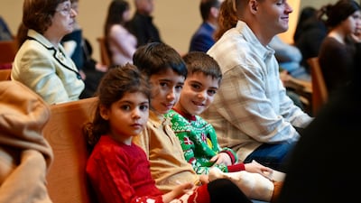 Children dressed in festive attire attend Mass at Our Lady of Lebanon church before Christmas. Photo credit: Nilanjana Gupta