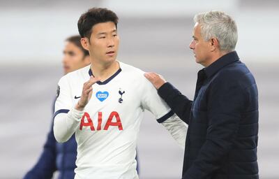 Tottenham manager Jose Mourinho with Son Heung-Min after the win over Everton. EPA