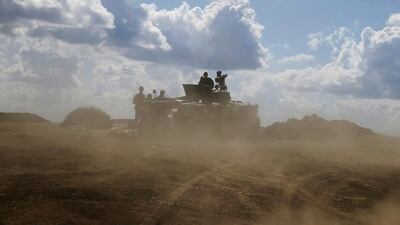 Ukrainian troops with an armoured vehicle near Debaltseve, in the eastern Donetsk region, on August 29, 2014. Gleb Garanich / Reuters