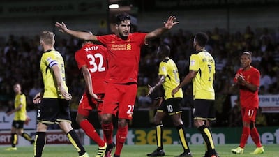 Liverpool’s Emre Can celebrates after Burton Albion’s Tom Naylor (not pictured) scores an own goal. Lee Smith / Reuters