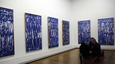 People look at the paintings of US artist Cy Twombly made in Italy in 2008. Francois Guillot/AFP