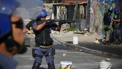 Police were deployed to the Philippi district of Cape Town, a city that suffers from regular gang violence and armed clashes between rival criminal groups. In this file photo, South African police fire rubber bullets to disperse residents of Masiphumelele during a protest against the police in Masiphumelele, Cape Town, South Africa. Nic Bothma / EPA