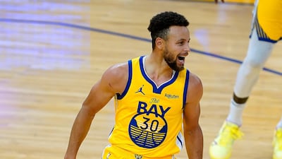 Golden State Warriors guard Stephen Curry smiles after scoring his 62 points against the Portland Trail Blazers in San Francisco. AP