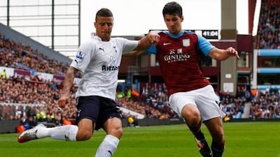 Kyle Walker, left in action for Tottenham Hotspur, is hopeful of being part of England's squad for Euro 2012.