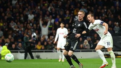 Harry Kane scores his team's fifth goal on Thursday. Getty