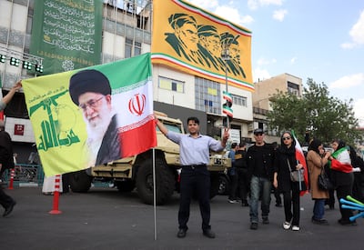 Iranians take part in a rally to show their support for new supreme leader Ayatollah Mojtaba Khamenei, in Tehran. EPA