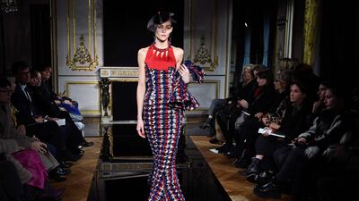 A model presents a creation by Giorgio Armani for spring/summer 2019 haute couture. AFP